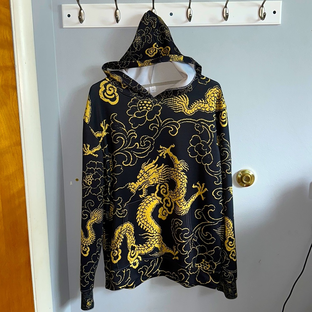 Got this off Amazon, size Medium but it goes kinda big. 100% polyester.